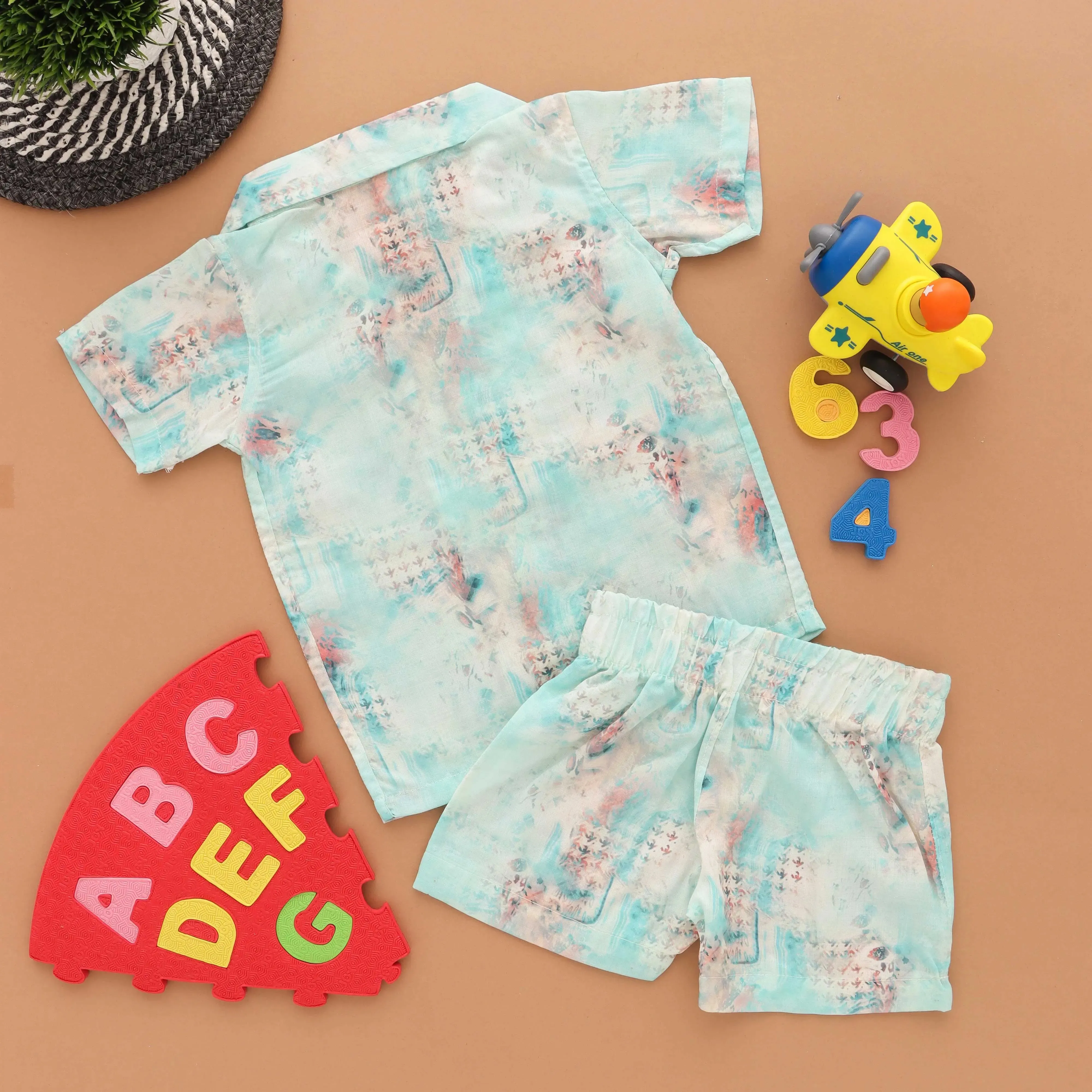 Nature's Charm: Boys' Shirt and Shorts Set with Floral Design